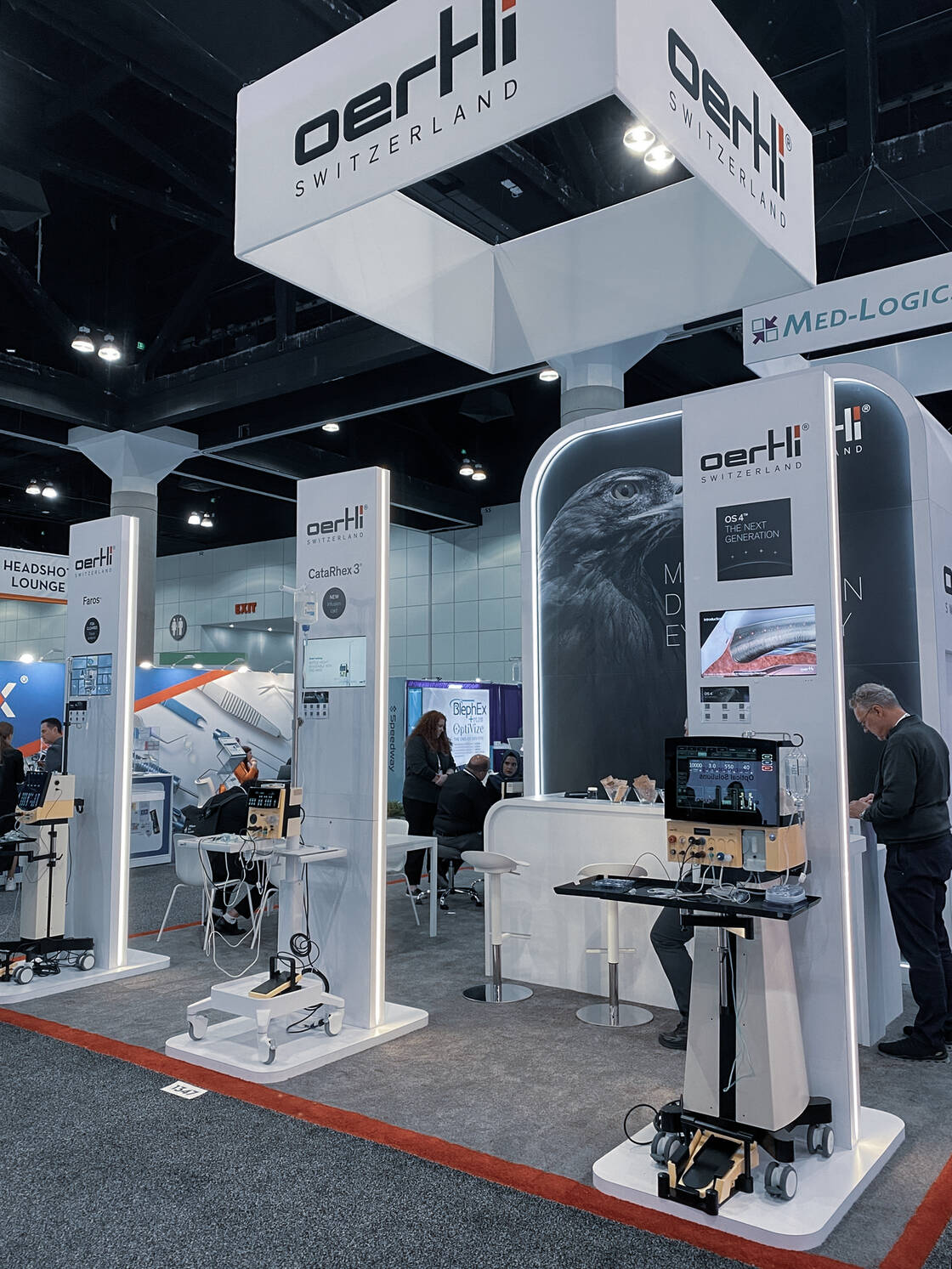 booth at ophthalmic conference with products faros and os 4. frontal view.